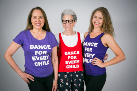 3 women wearing shirts that read "Dance for Every Child."
